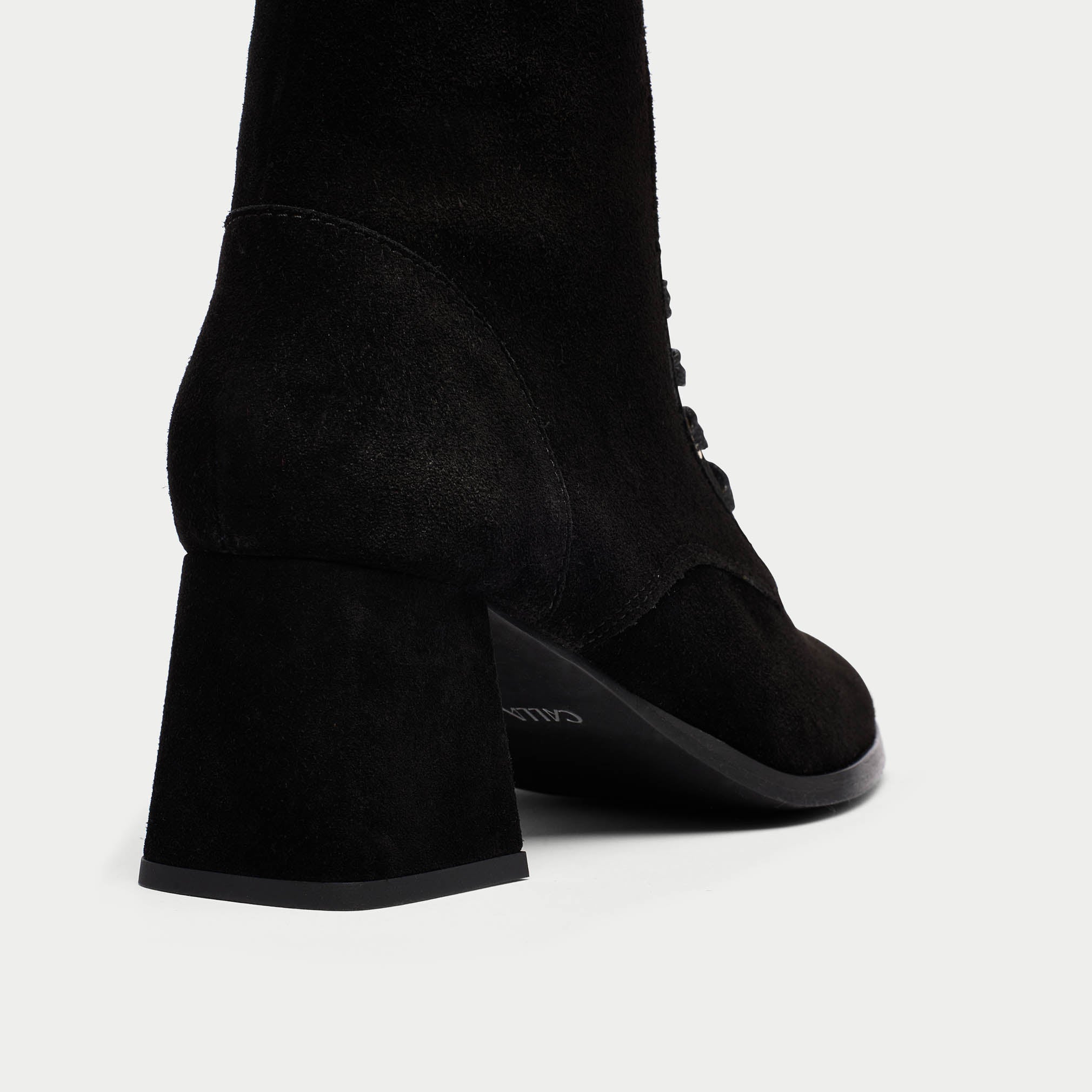 Cleo black suede heel close up