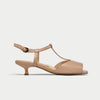 Beige sandal with a thin strap on a white background