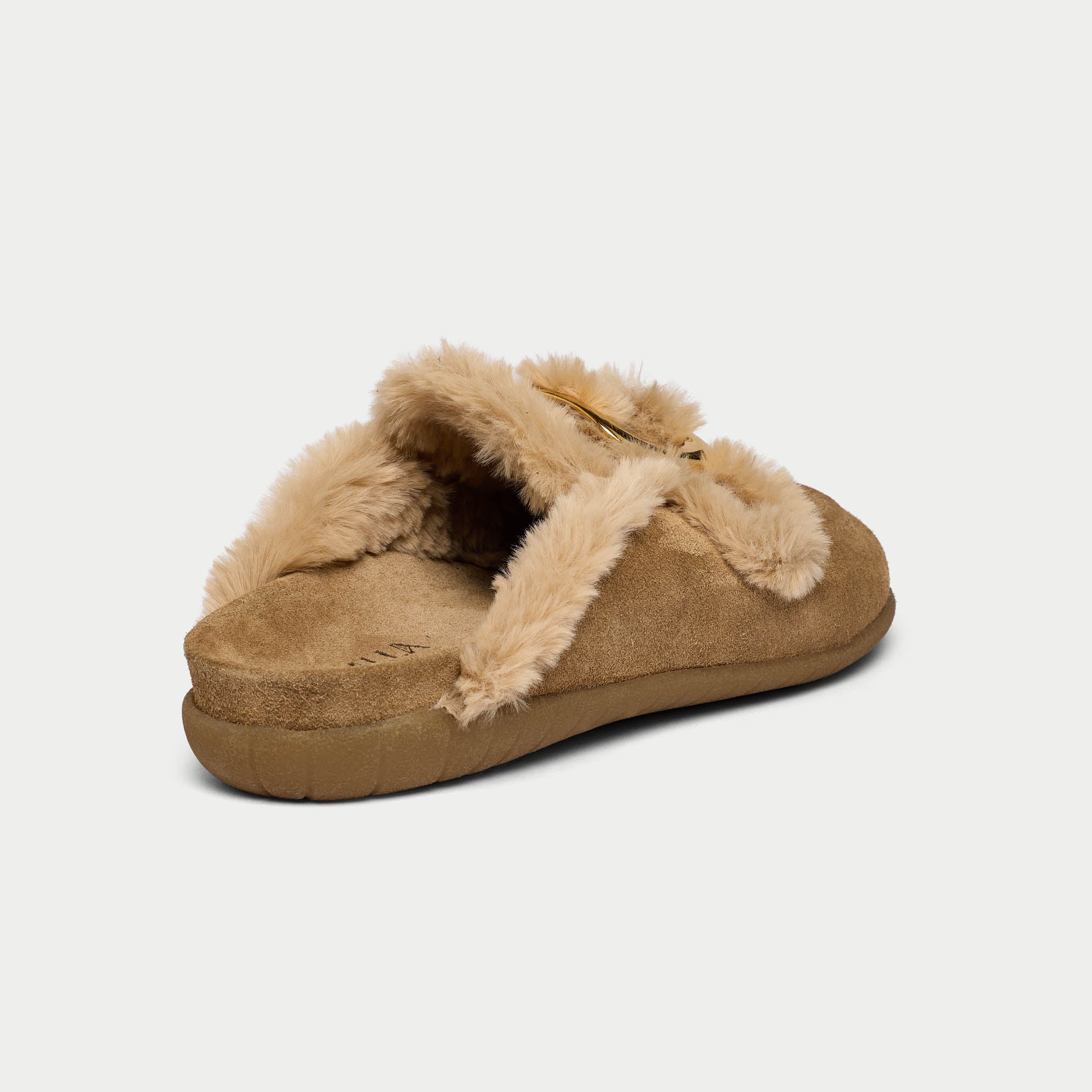 Tan slipper with fur trim on a light gray background