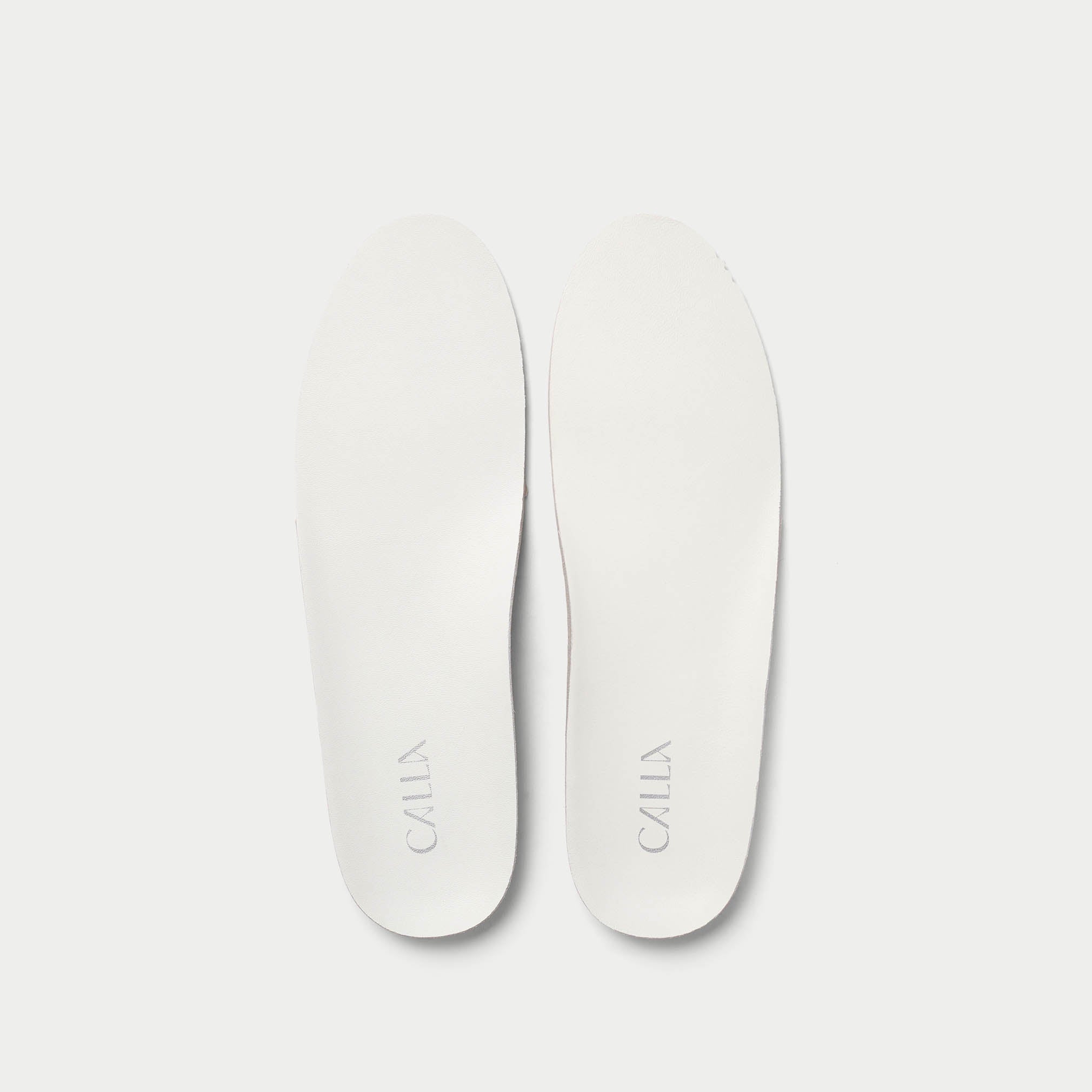 grey shoe insoles with branding 'Calla'