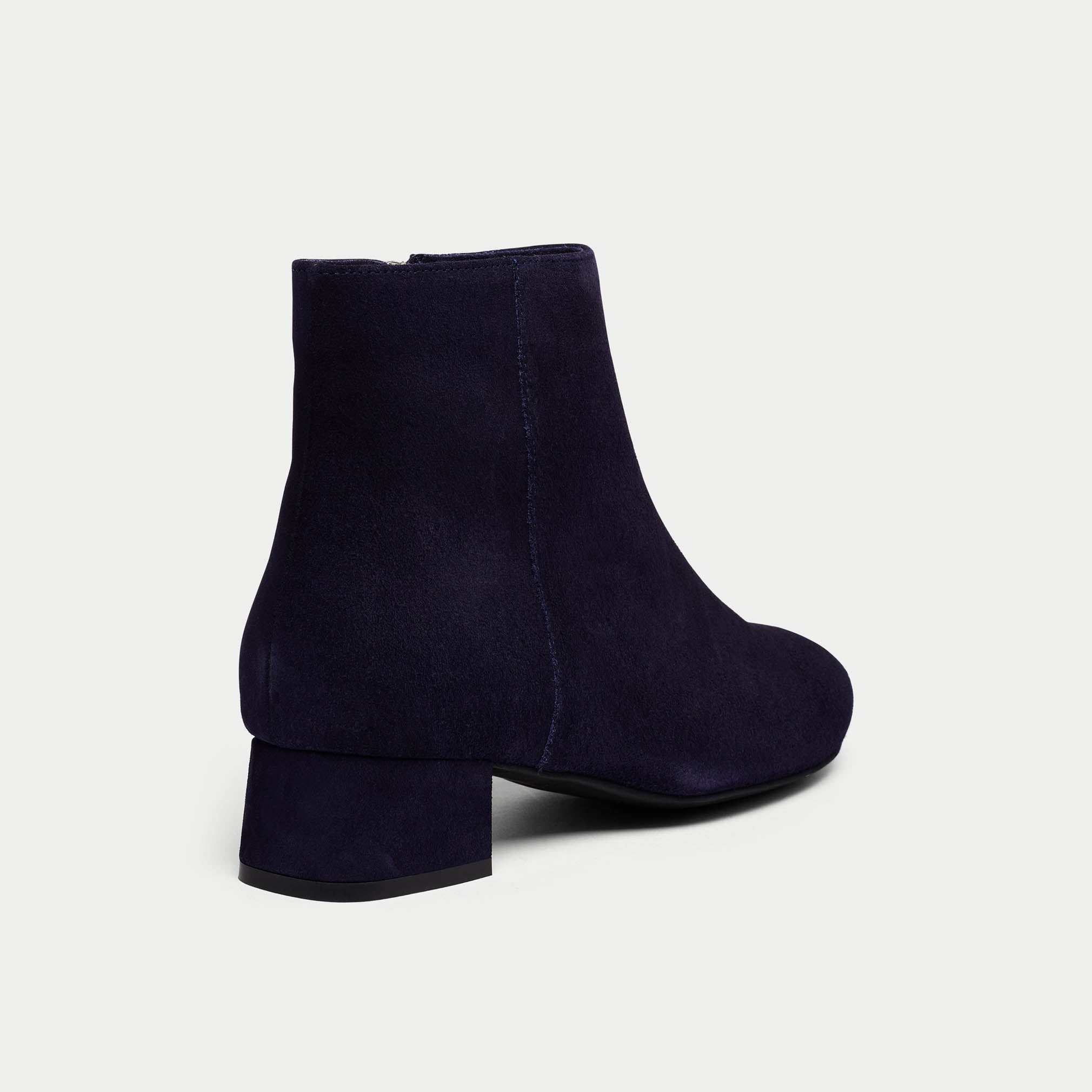 navy lexie suede boot on white background heel close up