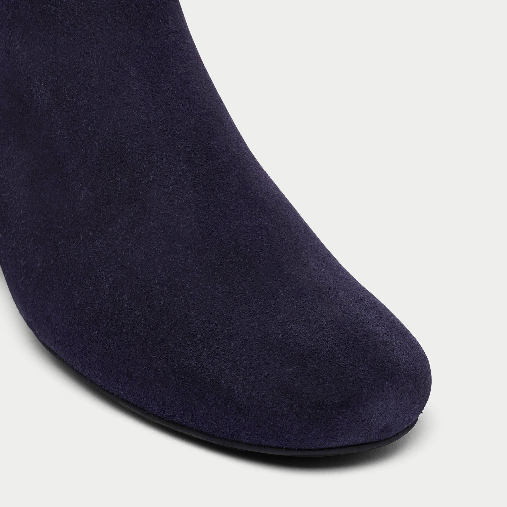 Navy sock on a light gray background