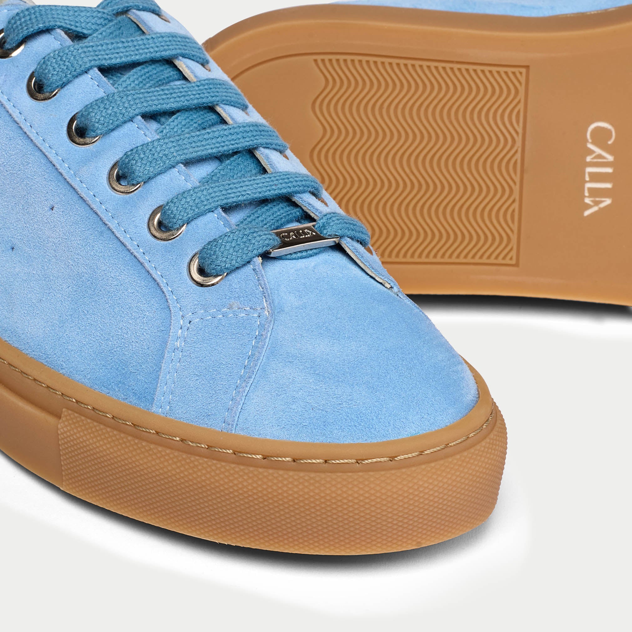 blue suede sneaker tip close up