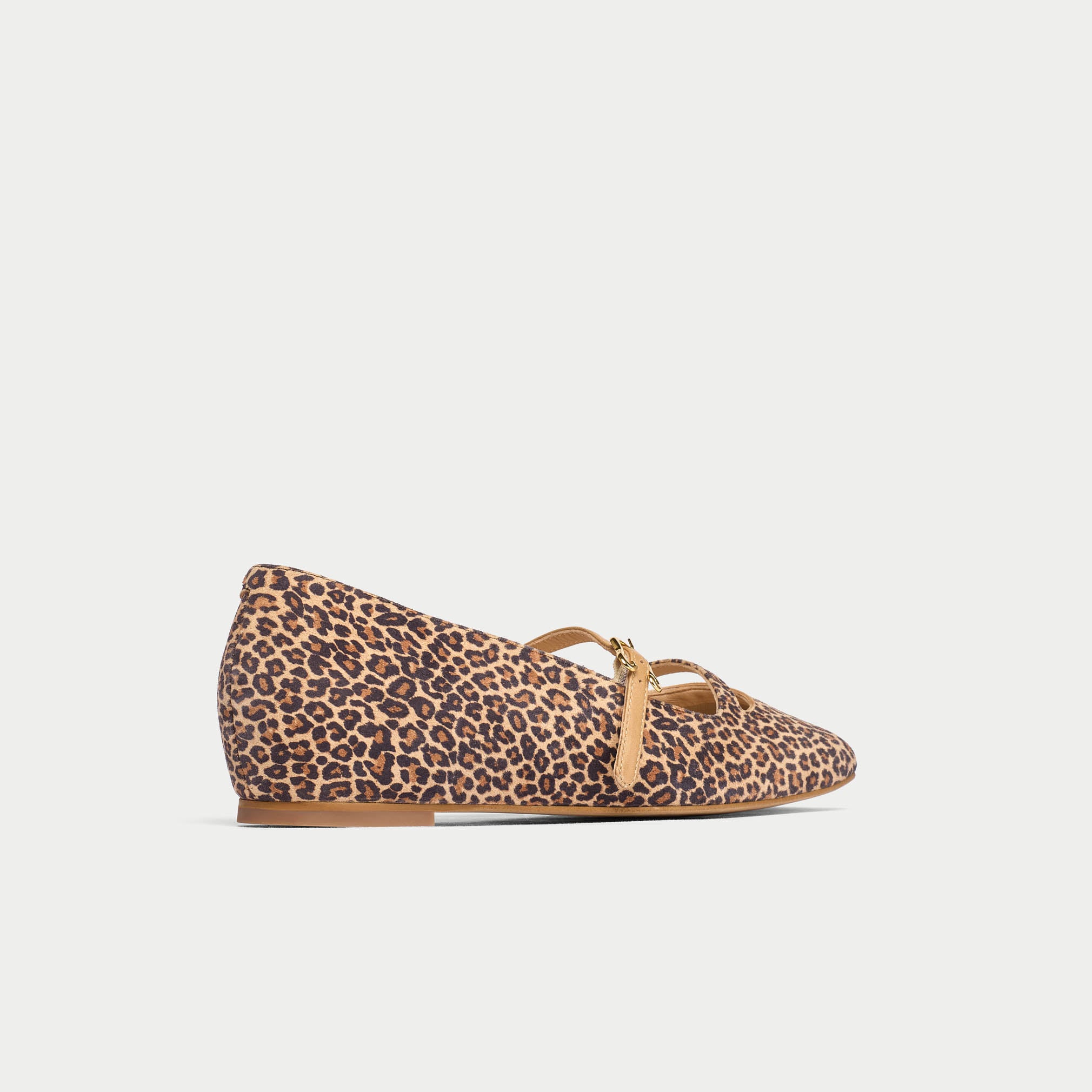 Leopard print flat shoe on a light gray background