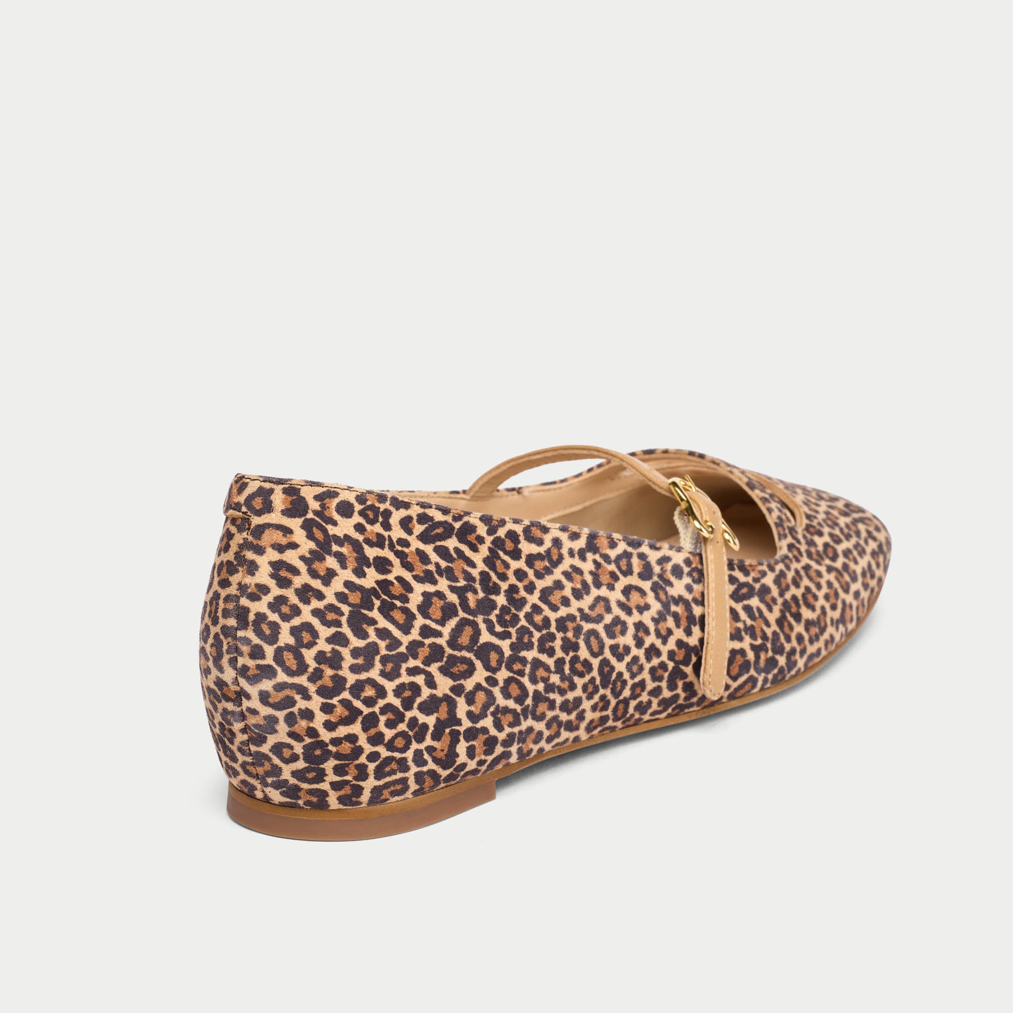 Leopard print flat shoe on a light gray background