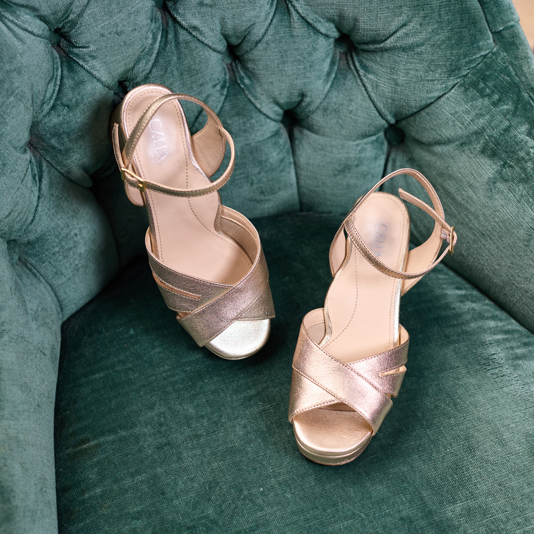gracie schampagne heel on the green chair