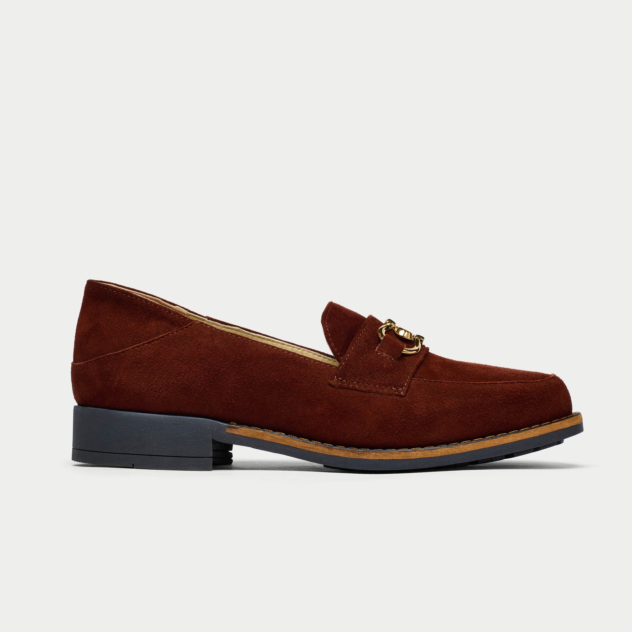 Brown suede loafer shoe on a light gray background