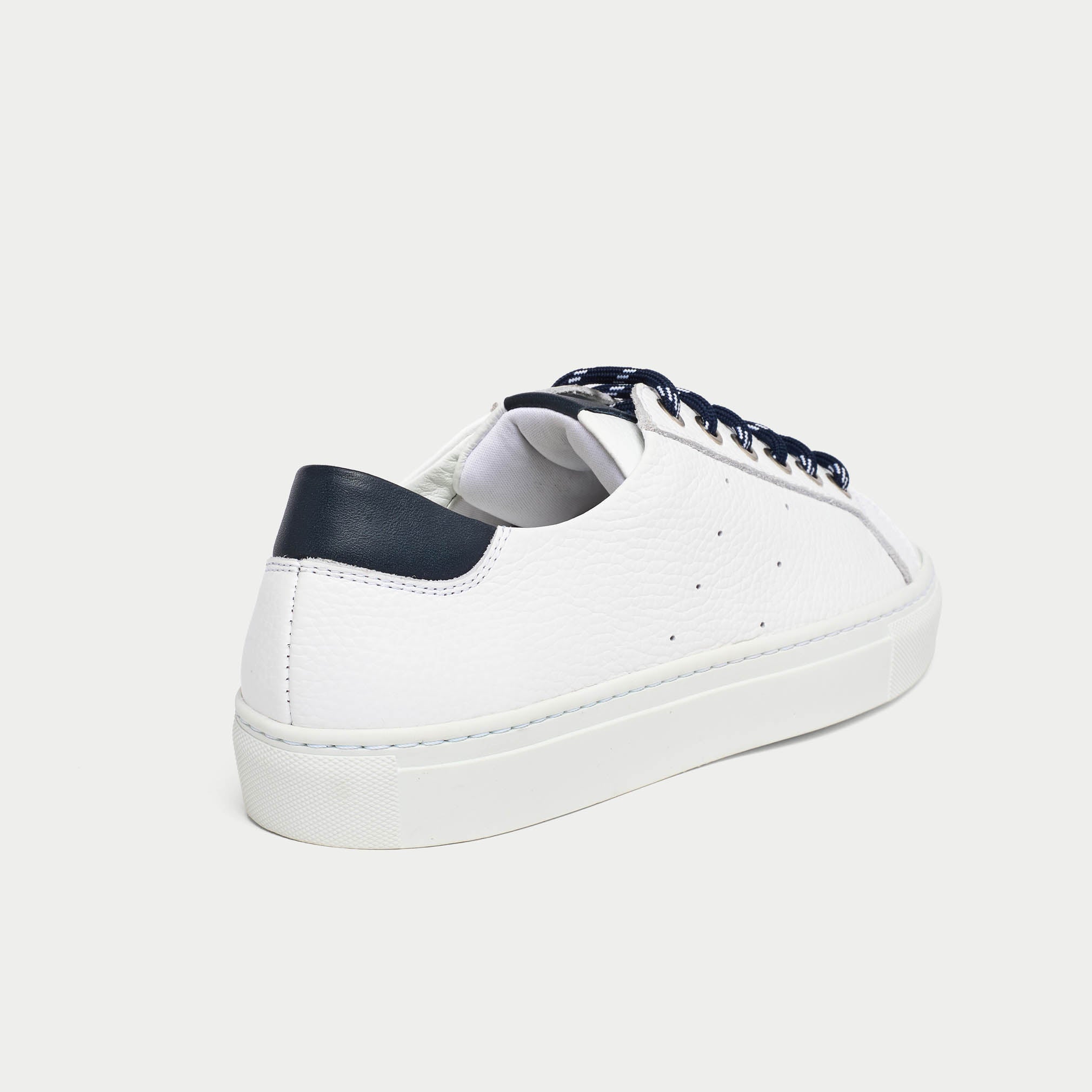 star white sneakers for bunions heel close up