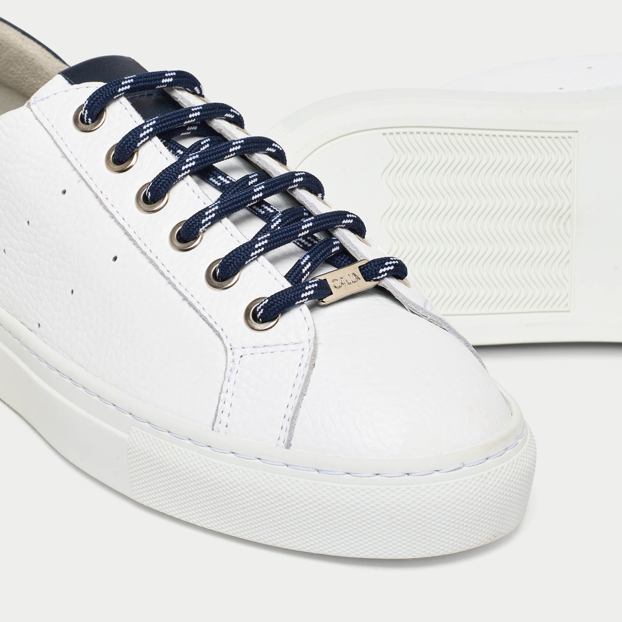 star white sneakers for bunions tip close up