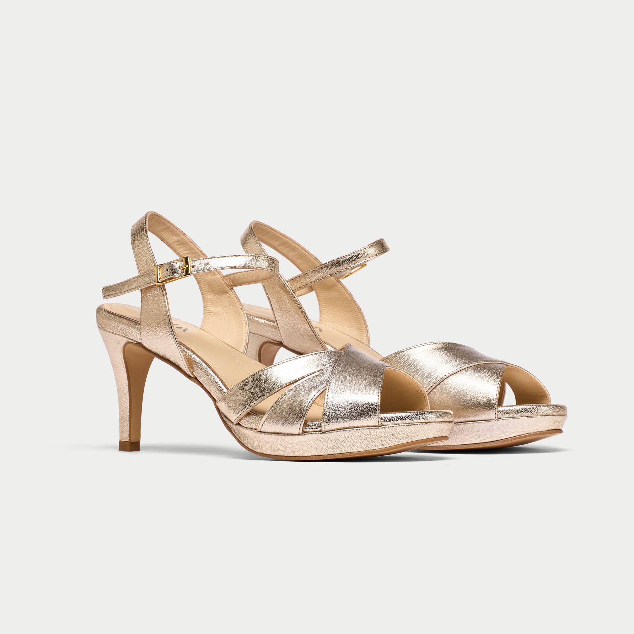 Emily champagne leather heels pair