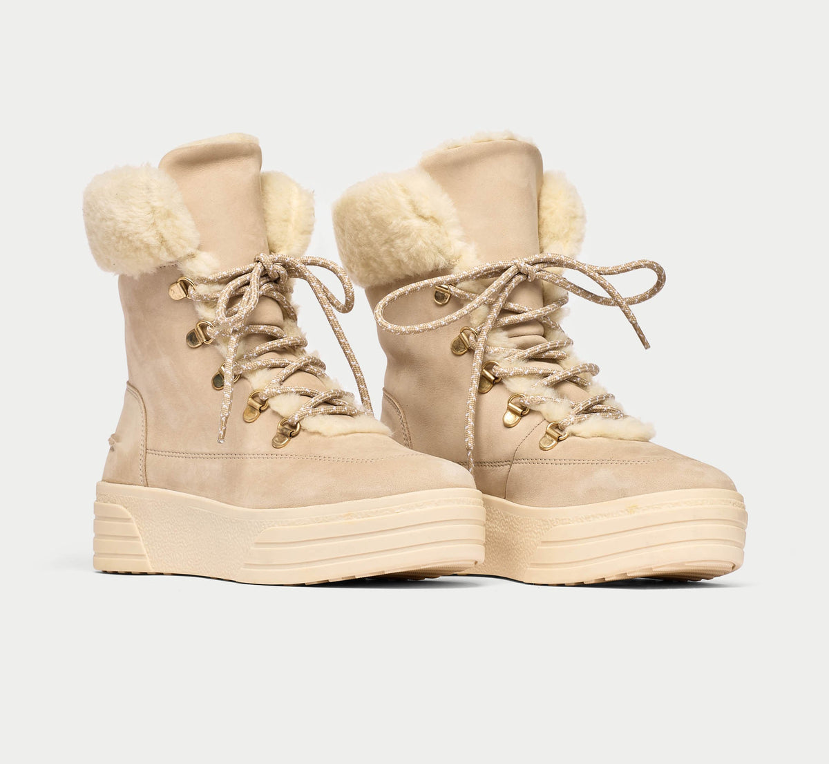 A pair of Calla Abbie lace-up boots in ice nubuck with a faux-fur lining