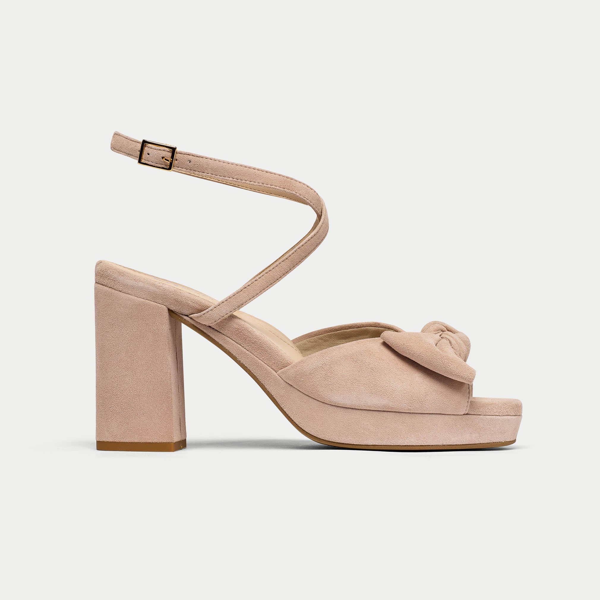 Beige high-heeled sandal with platform on a white background