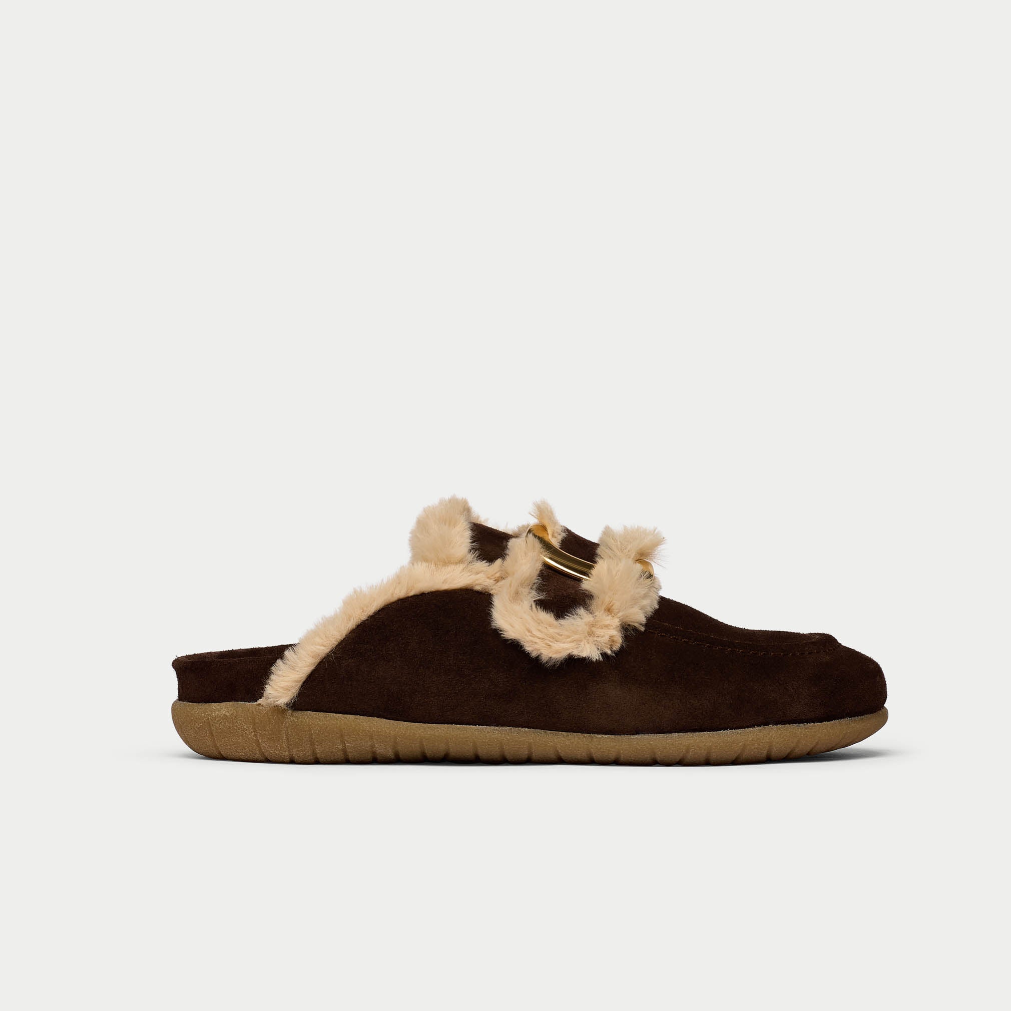 Brown slipper with beige fur trim on a white background