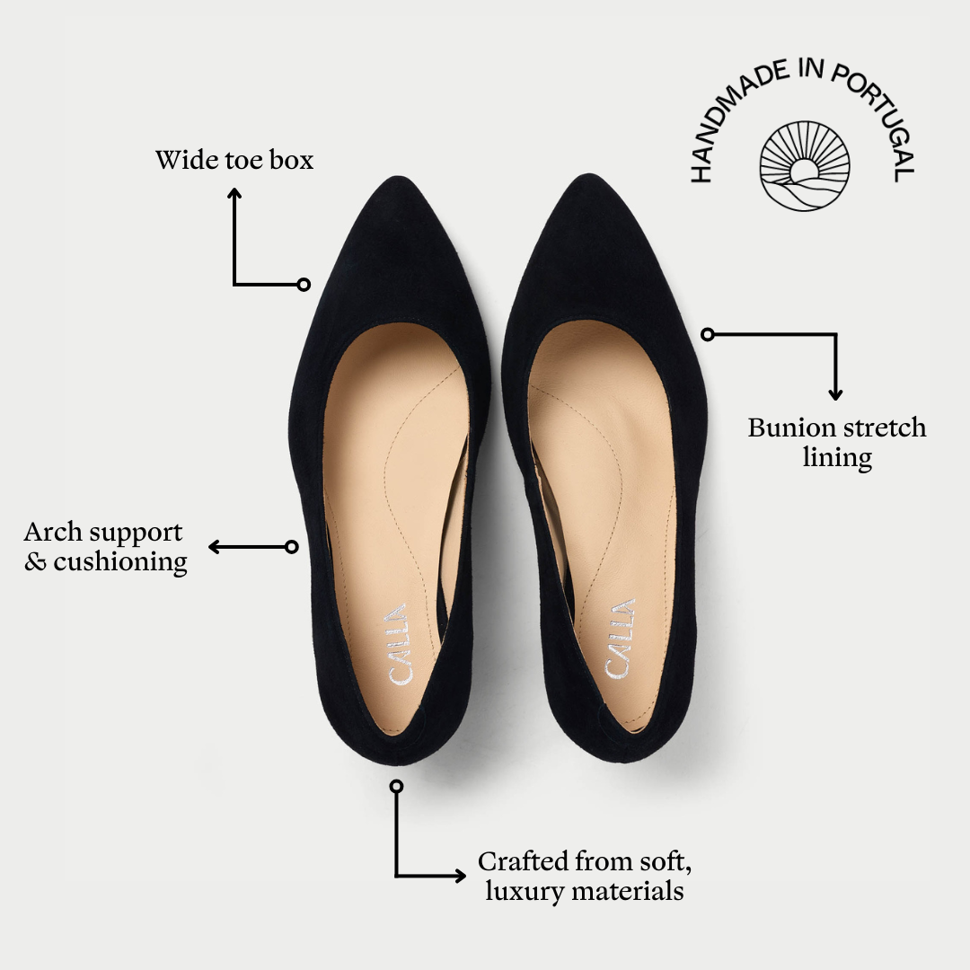 Black pointed-toe shoes with features highlighted on a white background