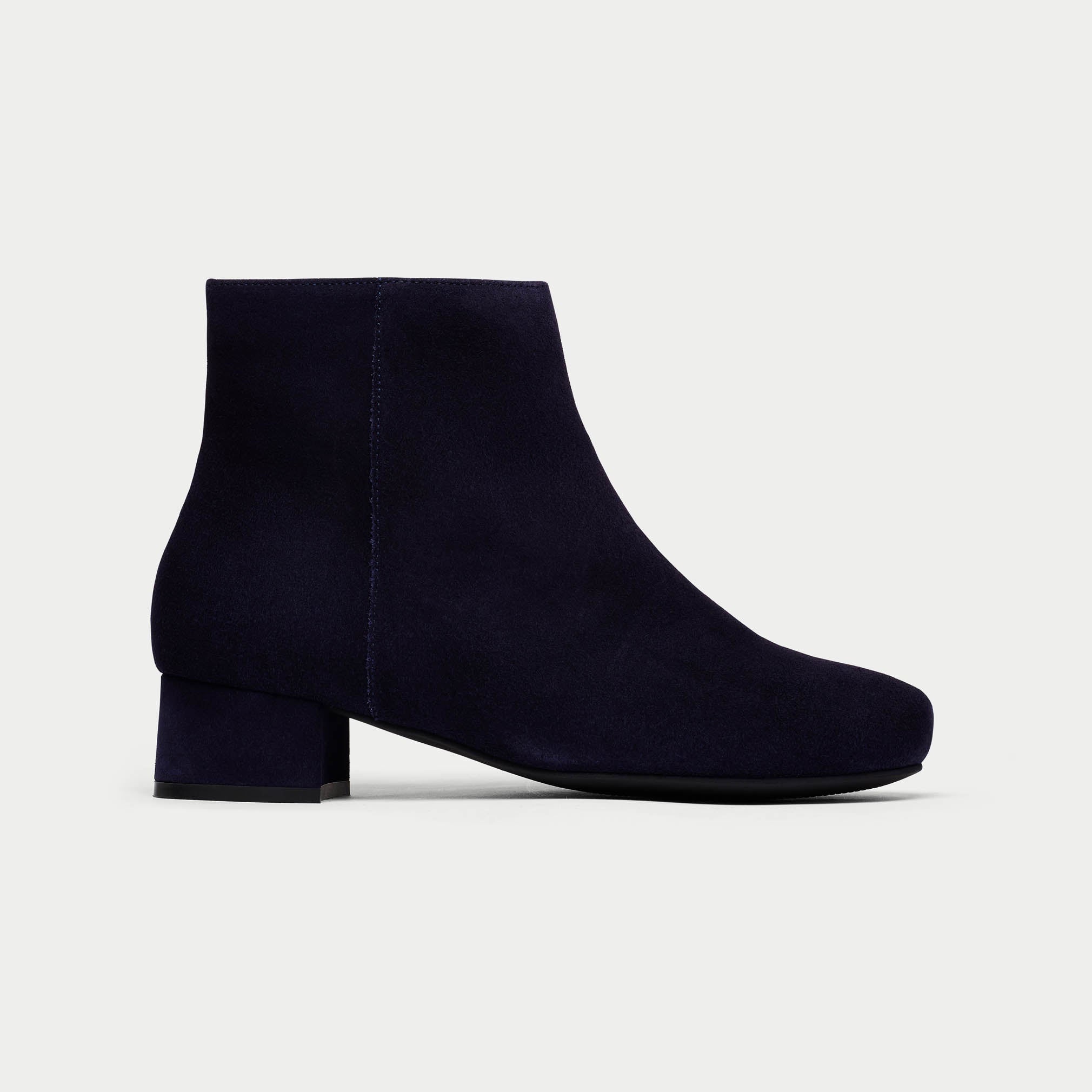 navy lexie suede boot on white background side view