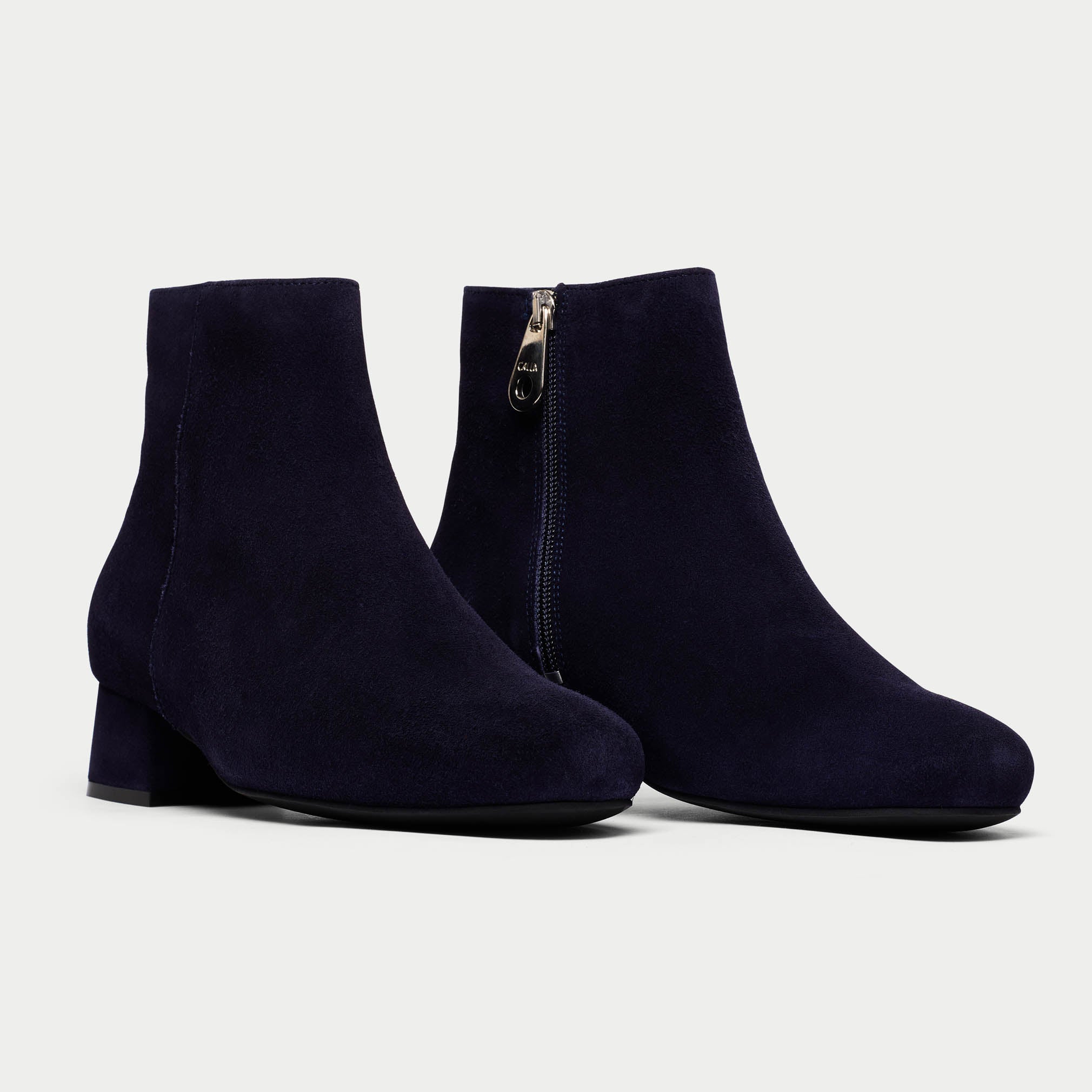 navy lexie suede boot on white background pair