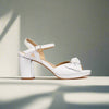 Lizzie white sandal heel side view
