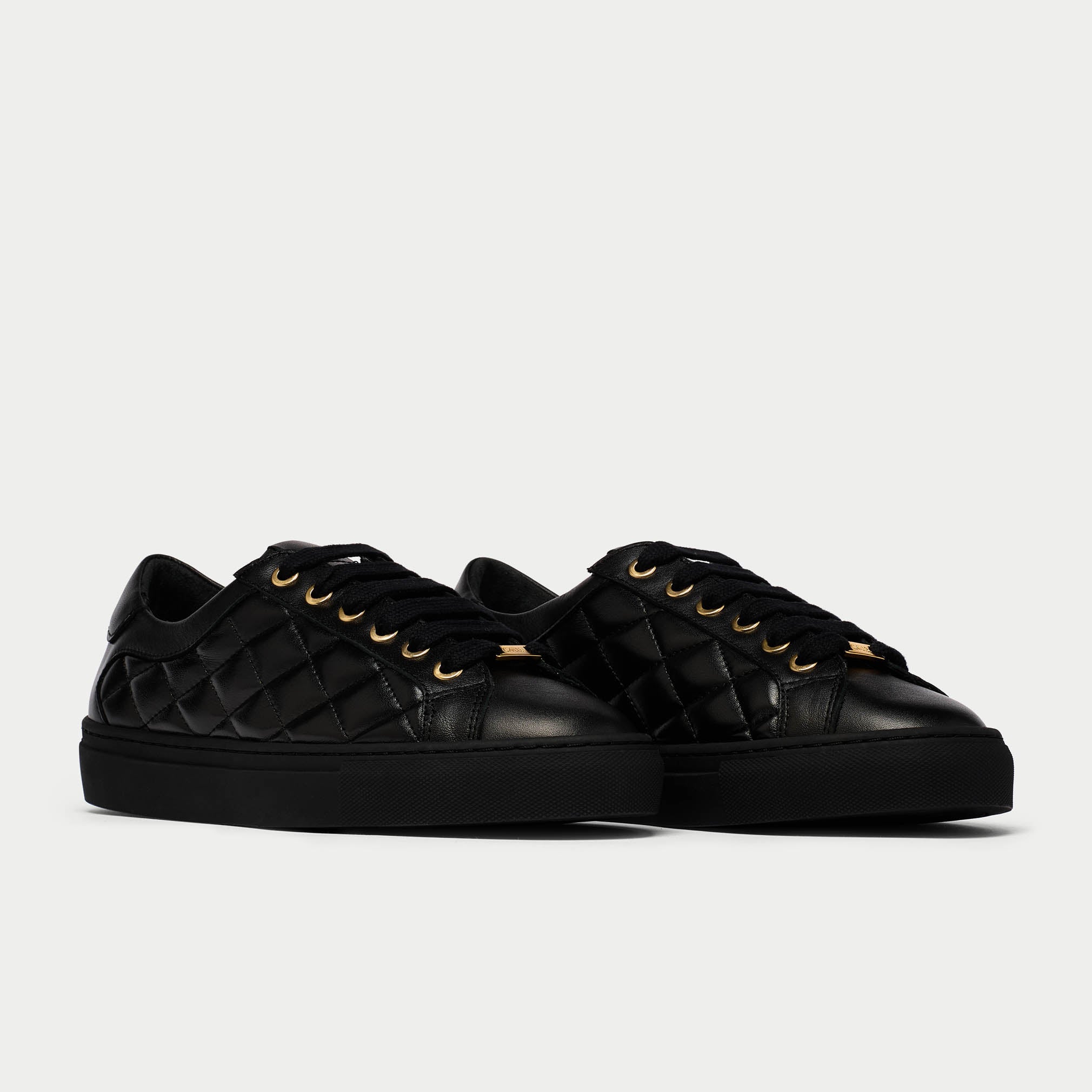 Star black quilted sneakers front/side view