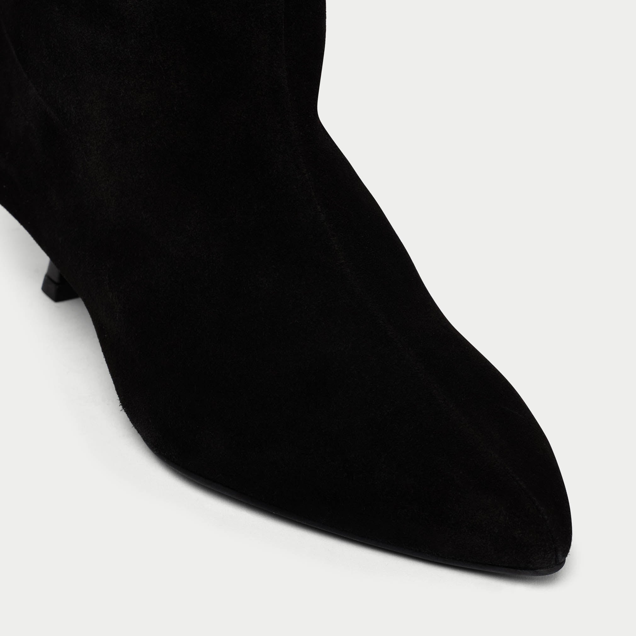 Black boot on a white background