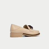 back view of neutral leather loafers for bunions
