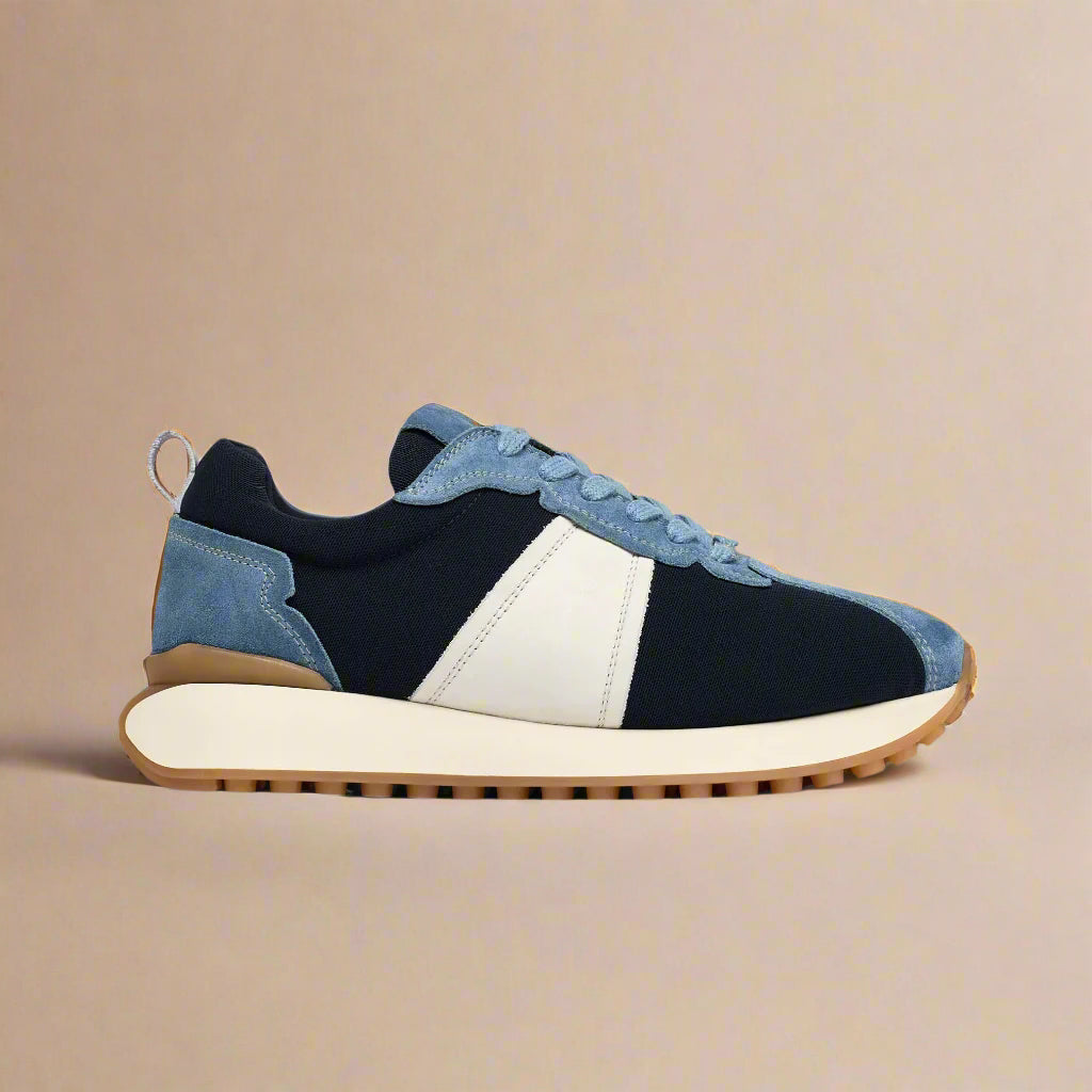 Cosmos denim blue sneaker on a light beige background