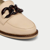 close up of neutral leather loafers for bunions
