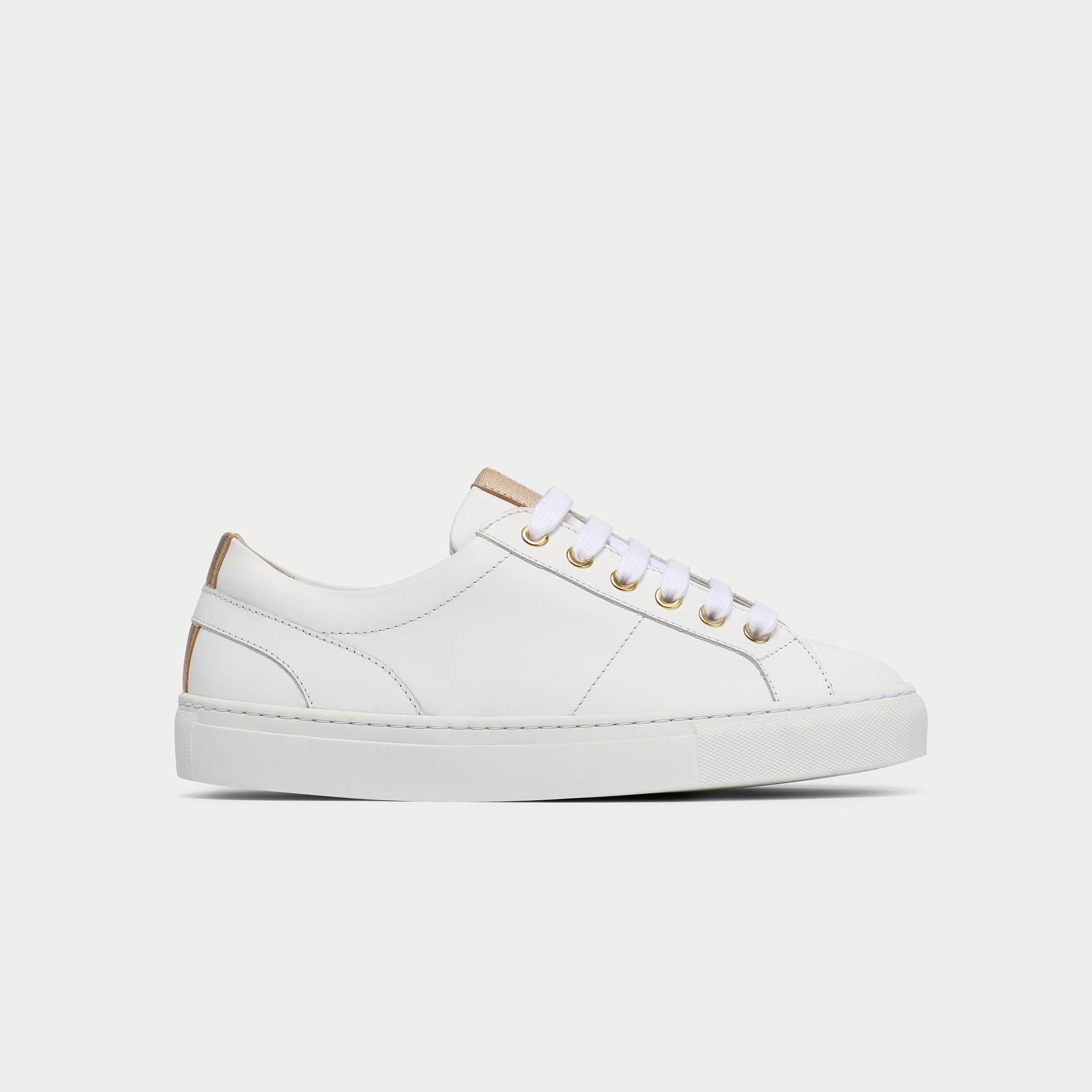 side view of luna white and champagne
