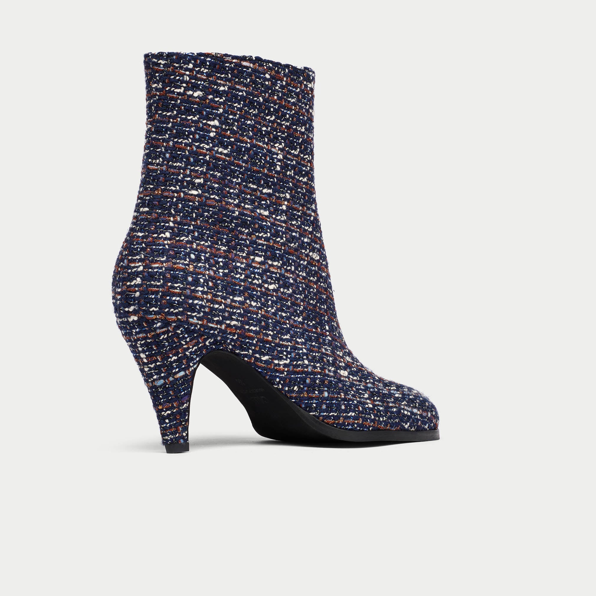 Maya Tweed ankle boot on a light gray background
