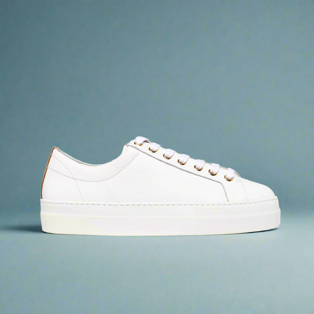 Saturn White sneaker on a light blue background