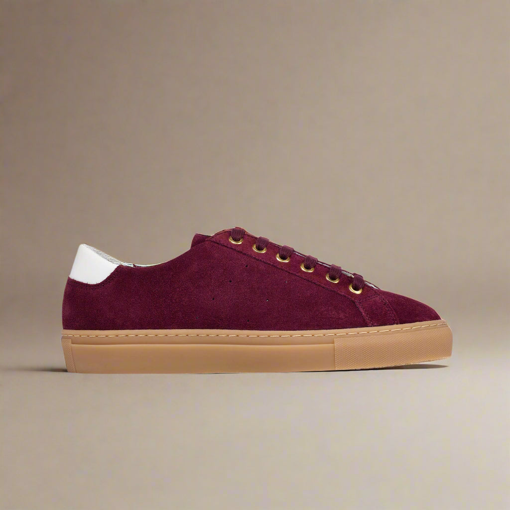 Star cherry suede sneaker on a beige background