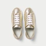 star gold trainers pair top view