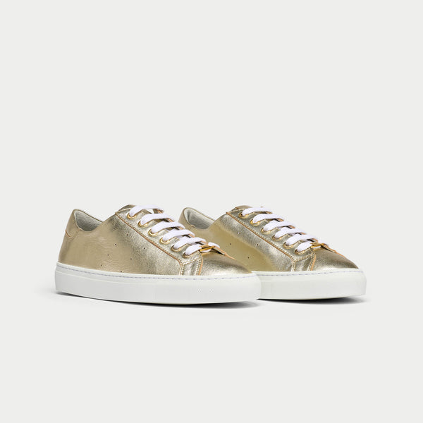 star gold trainers pair