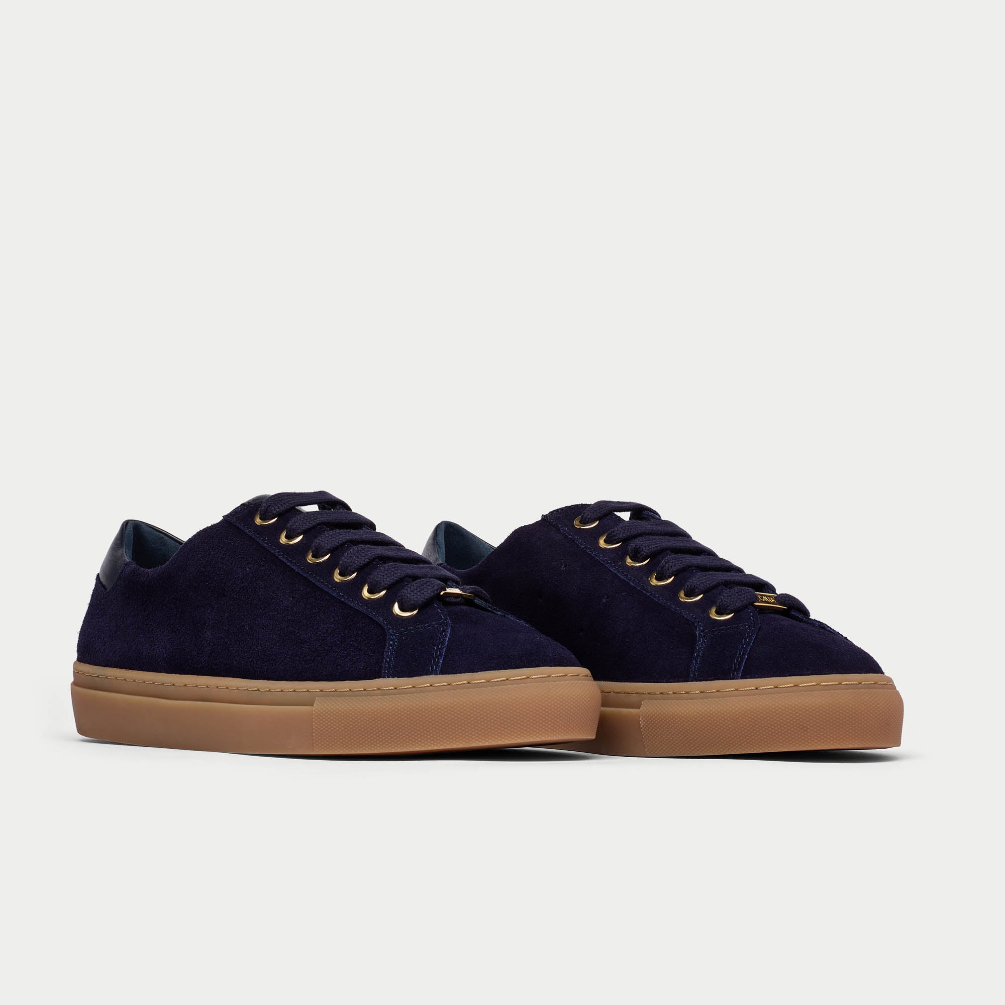 pair of navy suede trainers