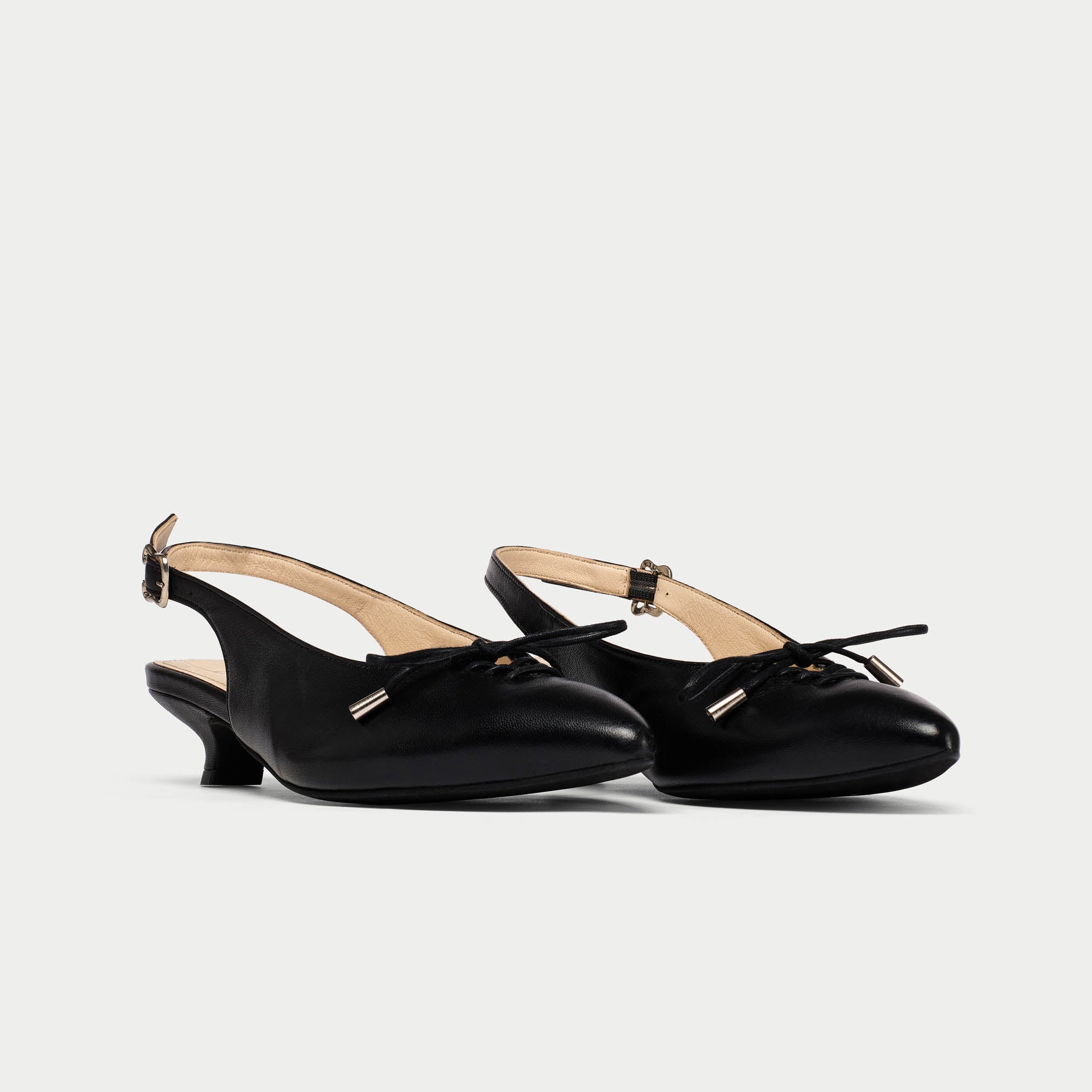 pair of trudie slingbacks