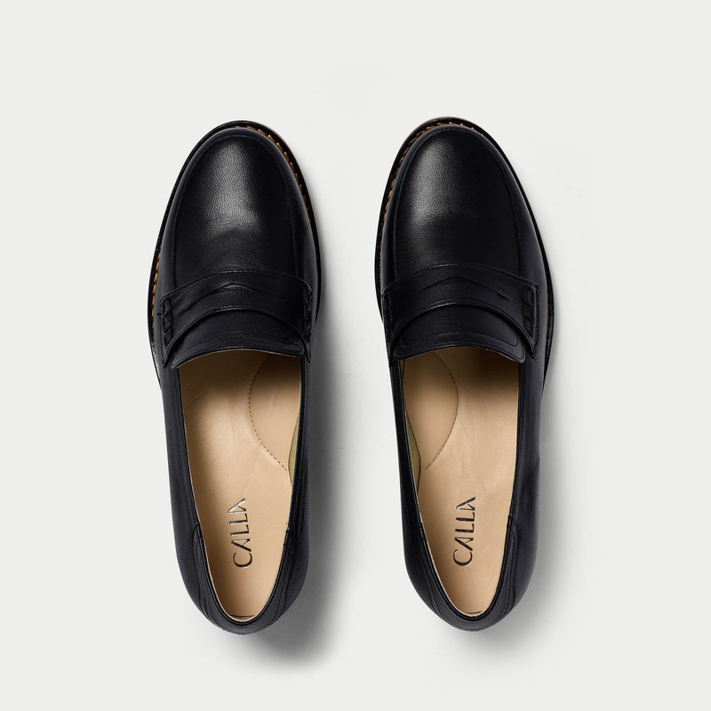pair of black leather loafers for bunions top view