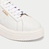 comet white leather trainer for bunions close-up