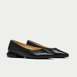 black leather flats pair